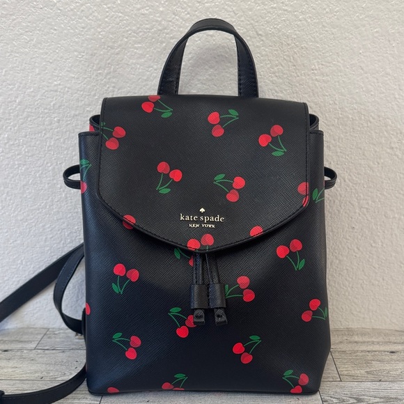 kate spade Handbags - Kate Spade Lizzie Med Flap Tossed Cherry Print Backpack